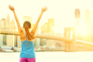 bigstock-Happy-cheering-woman-in-New-Yo-45657904